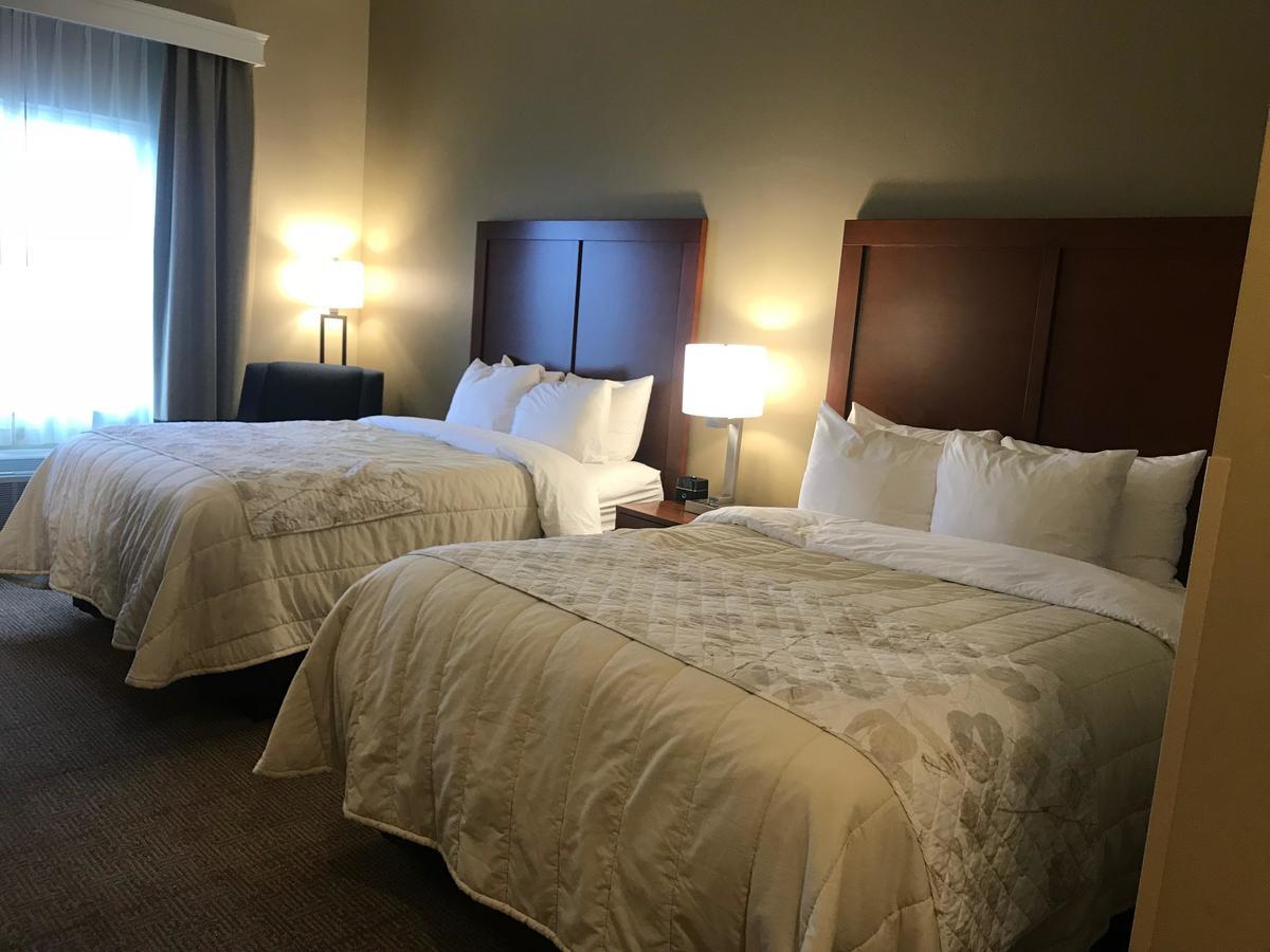 Heartland Inn And Suites Wheatland Buitenkant foto