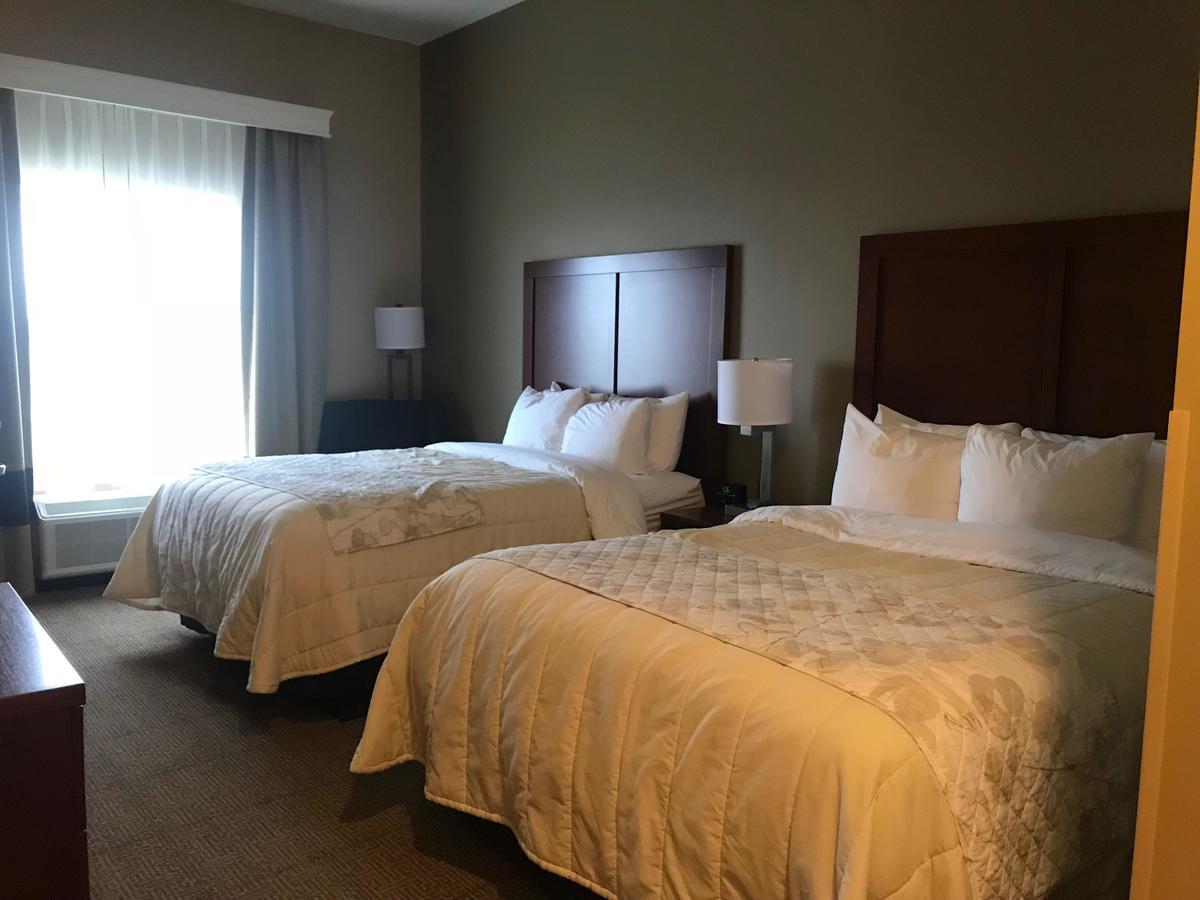 Heartland Inn And Suites Wheatland Buitenkant foto